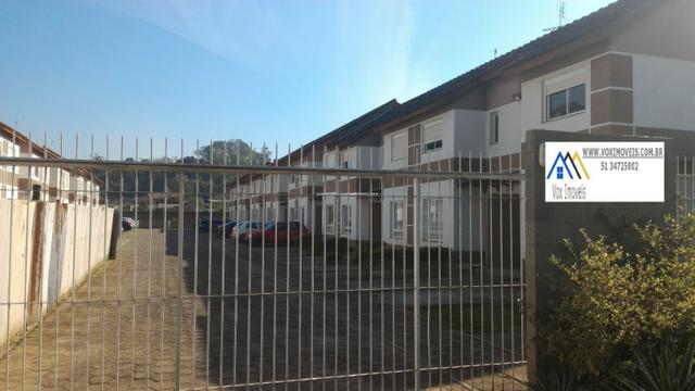 Casa de Condomínio em Nova Santa Rita, com pátio e 2 vagas para carro