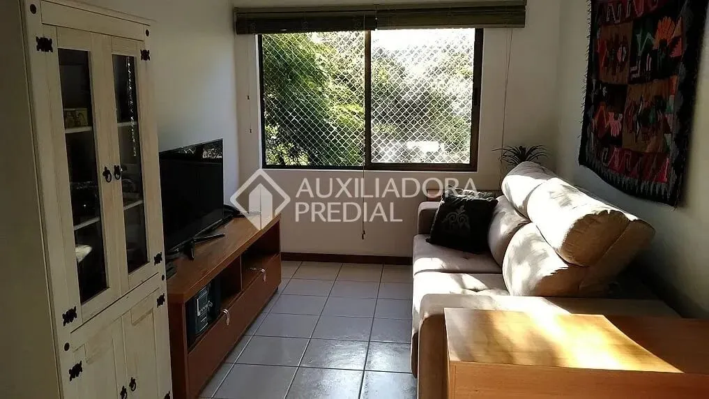 apartamento de 1 dormitório com vaga dupla e churrasqueira.