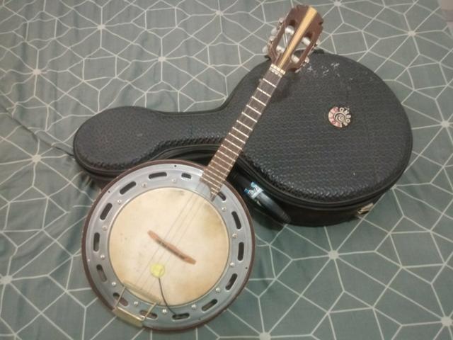 Troco Banjo Luthier por Notebook