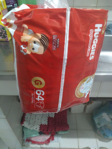 Pacote de 64 fraldas tamanho g Huggies - Foto 2