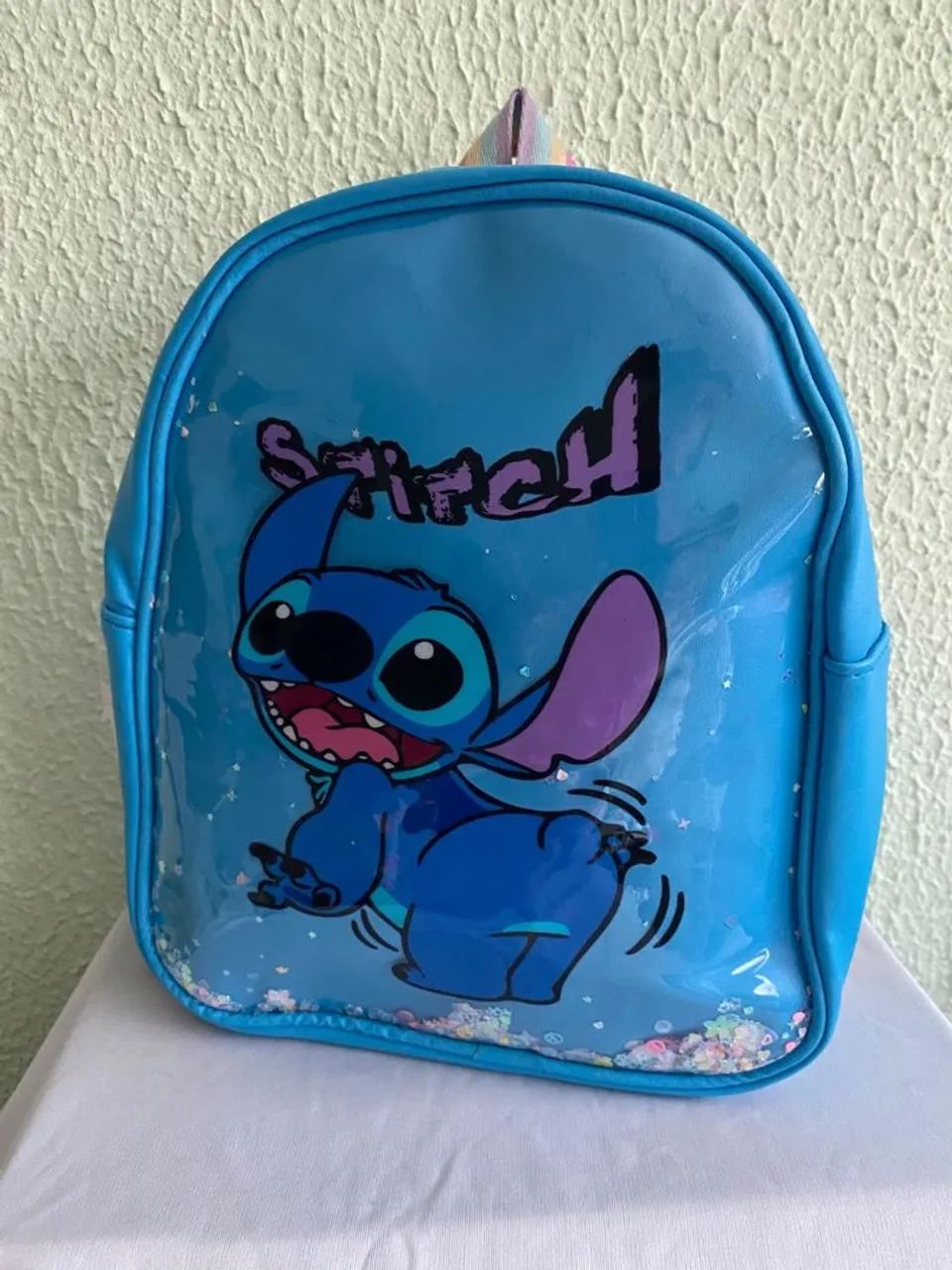 Mochila plastificada Stock<br>R$ 89,00