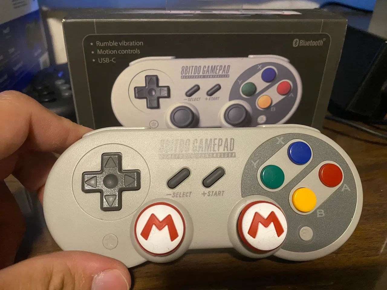 Controle 8Bitdo SNES na caixa 