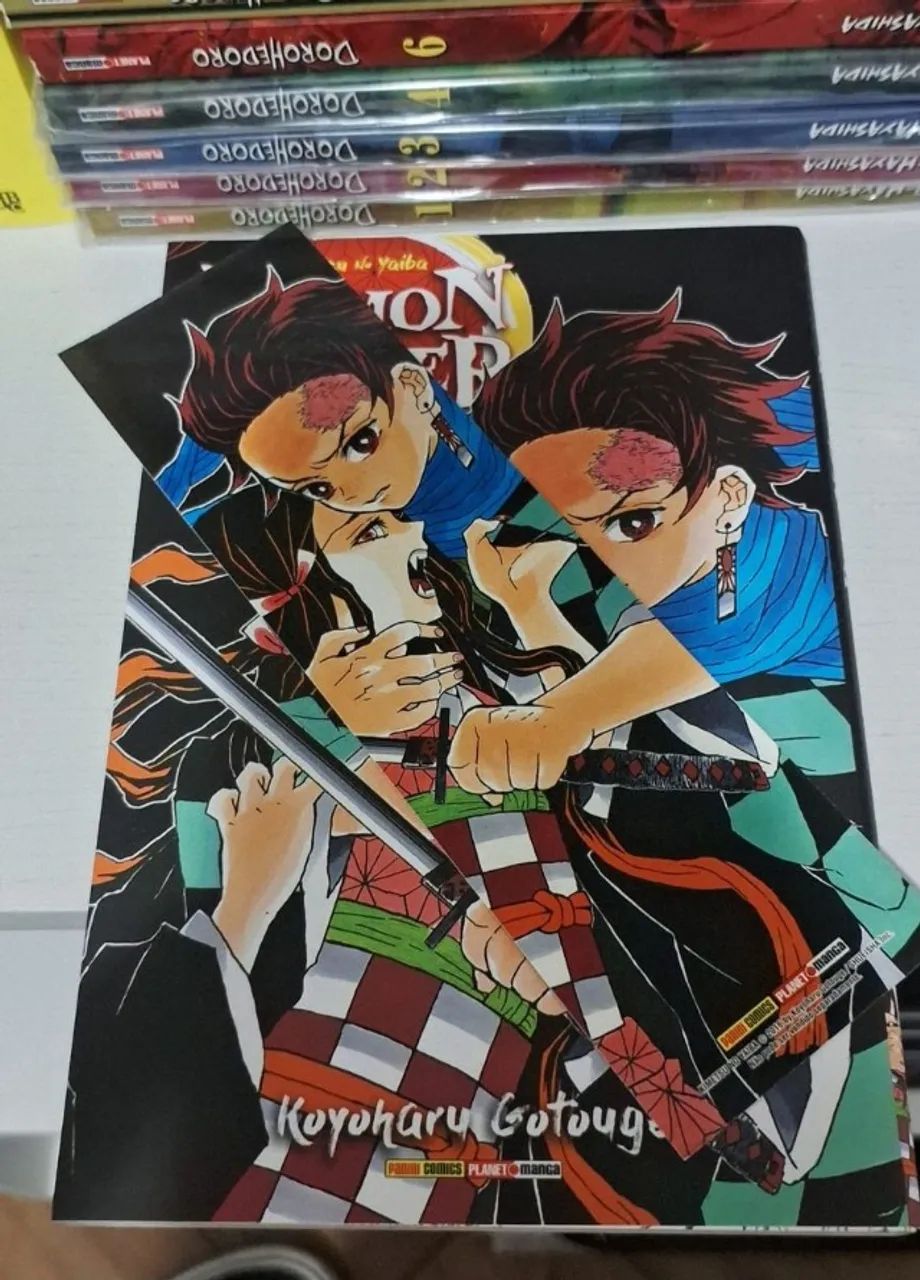 Mangá demon slayer volume 1 e 2 - Foto 3
