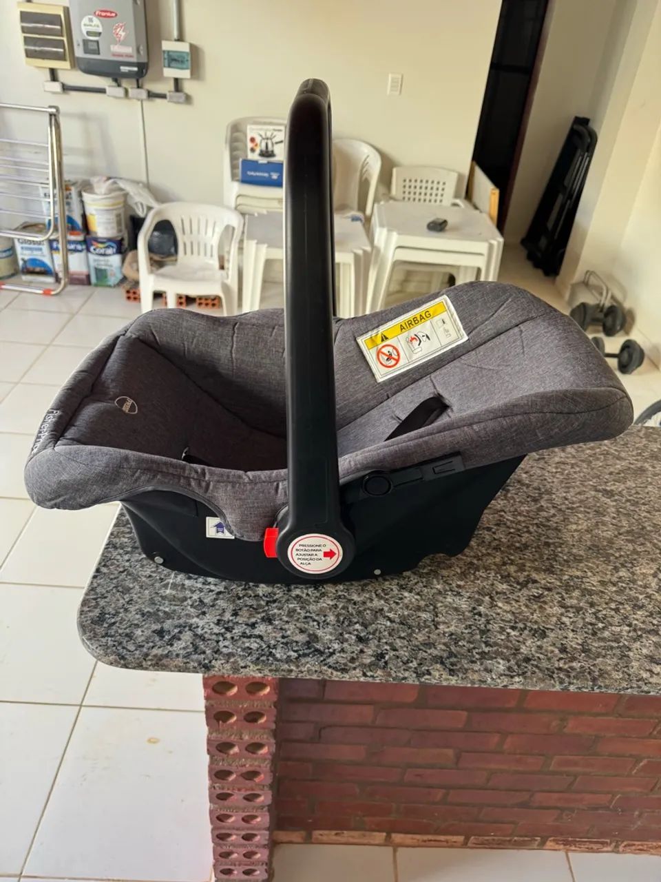 Bebê conforto. 