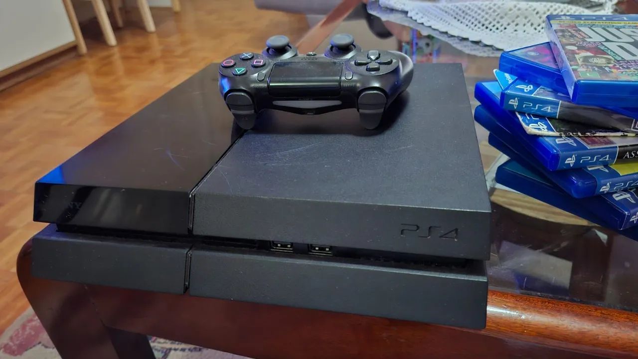 Ps4 fat 500GB com 8 jogos recem revisado (troquei a pasta térmica