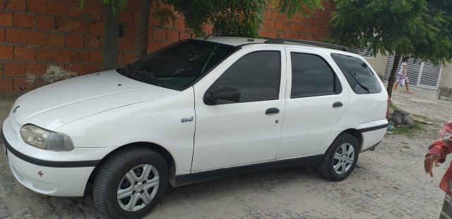 Vendo um palio weekend 99 carro é completo e esta todo em dias - Foto 4
