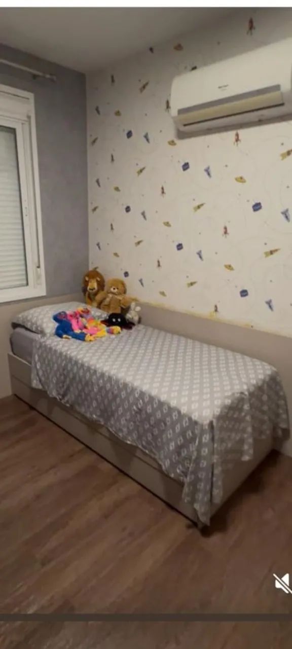 Cama de solteiro com cama auxiliar