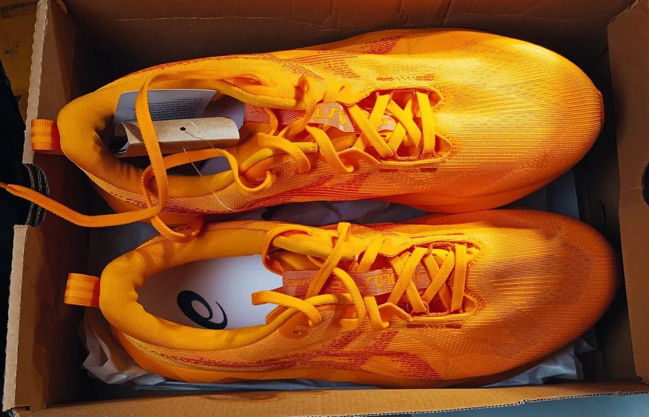 Tênis laranja Asics 43  5 blast - Foto 2
