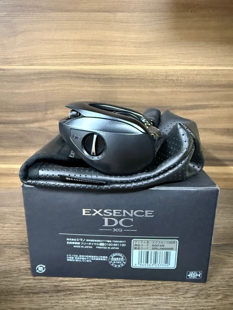 Carretilha Shimano Exsence Dc Xg Left Cor Preto Lado Da Manivela