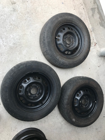 Roda + pneu 175/70/13 R$ 99