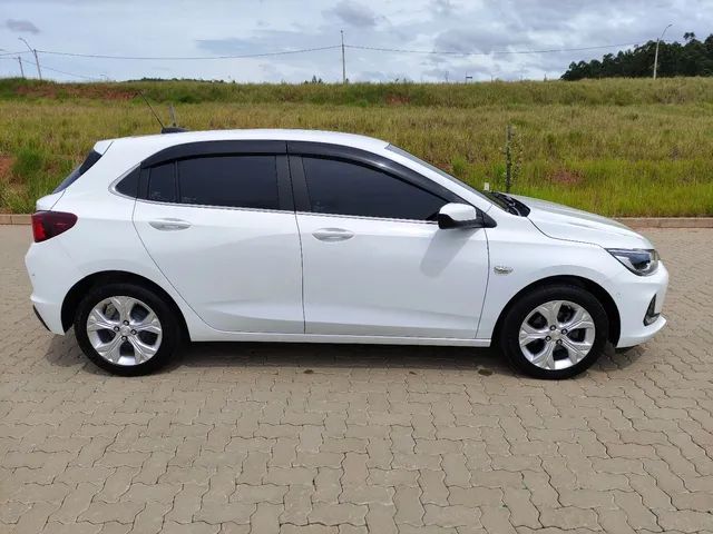Onix 1.0 Turbo PREMIER 2 baixíssimo km - Foto 4