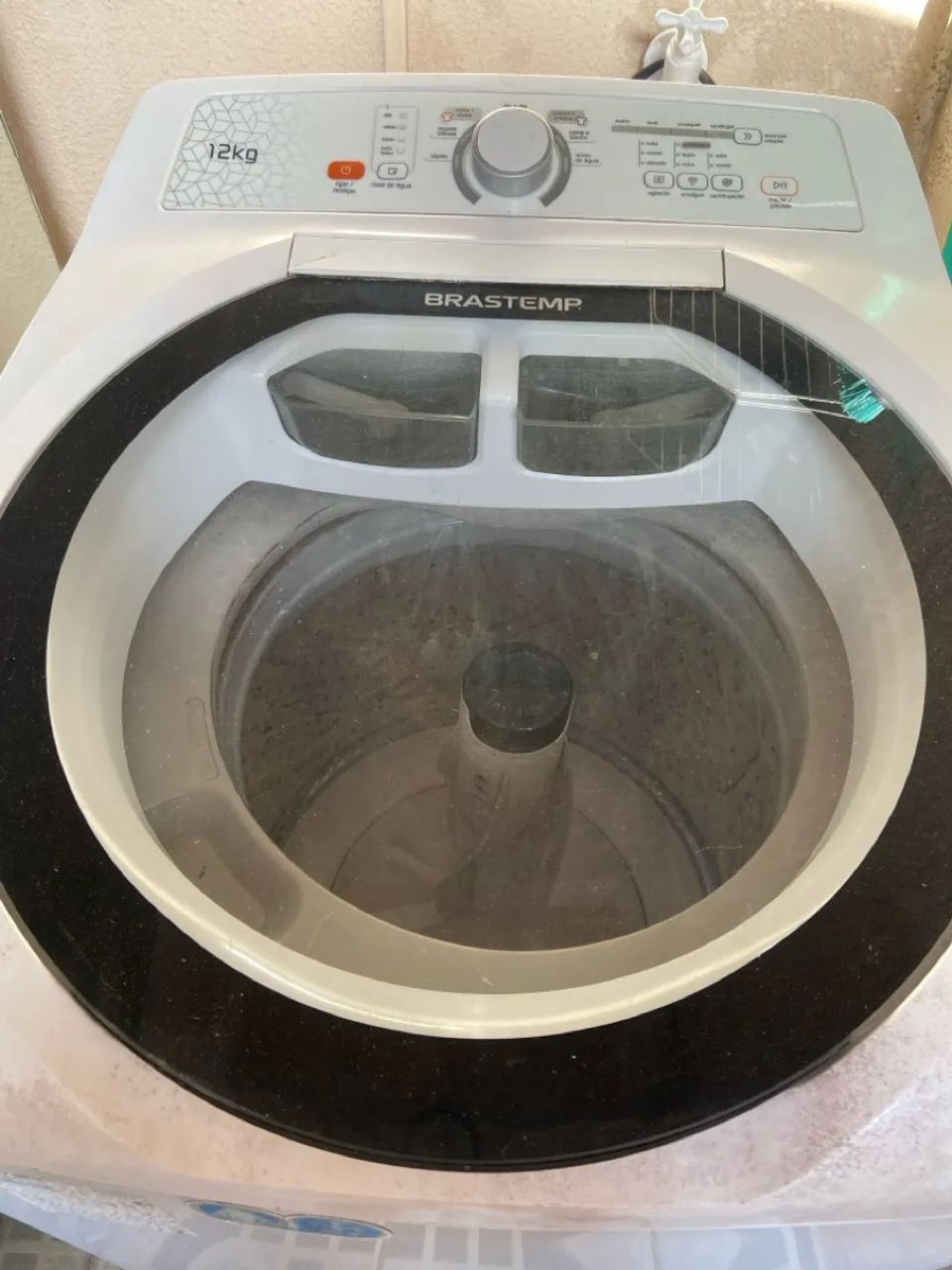 Máquina de lavar com defeito