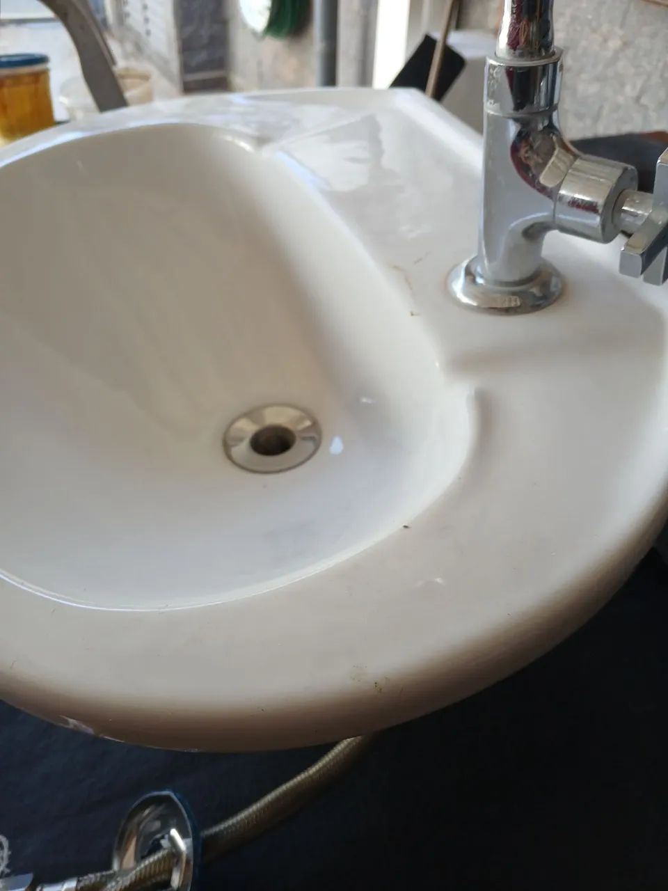 Complete sink set, faucet, valve, and metallic flexible coupling, unused, brand new.