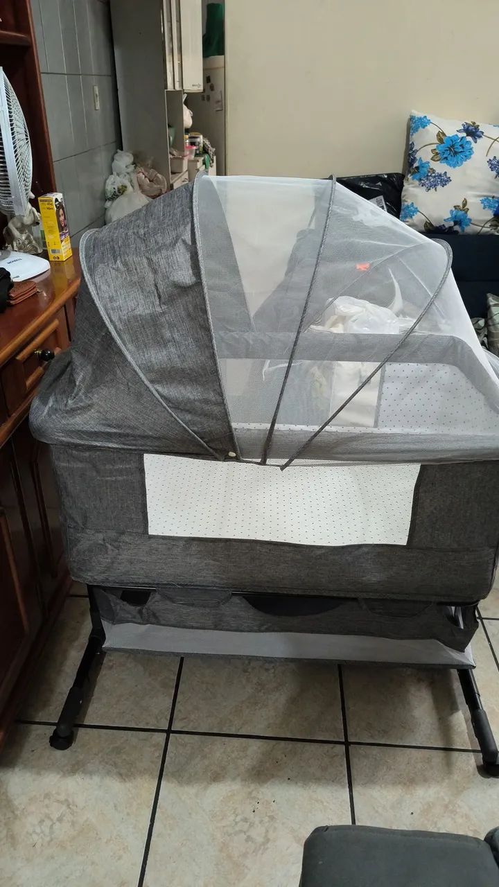 Berço portátil com mosqueteiro