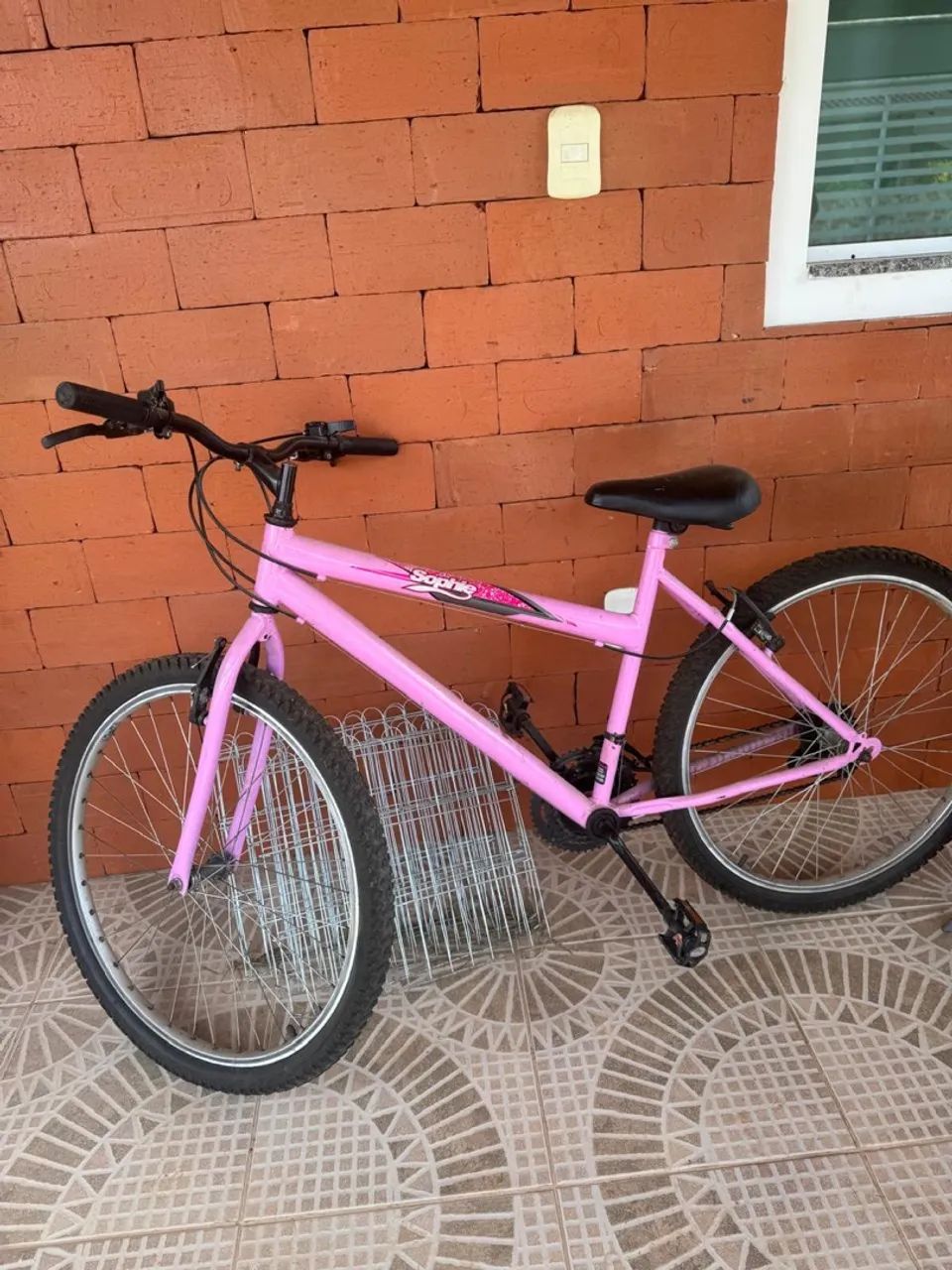 Bicicleta urbana rosa 