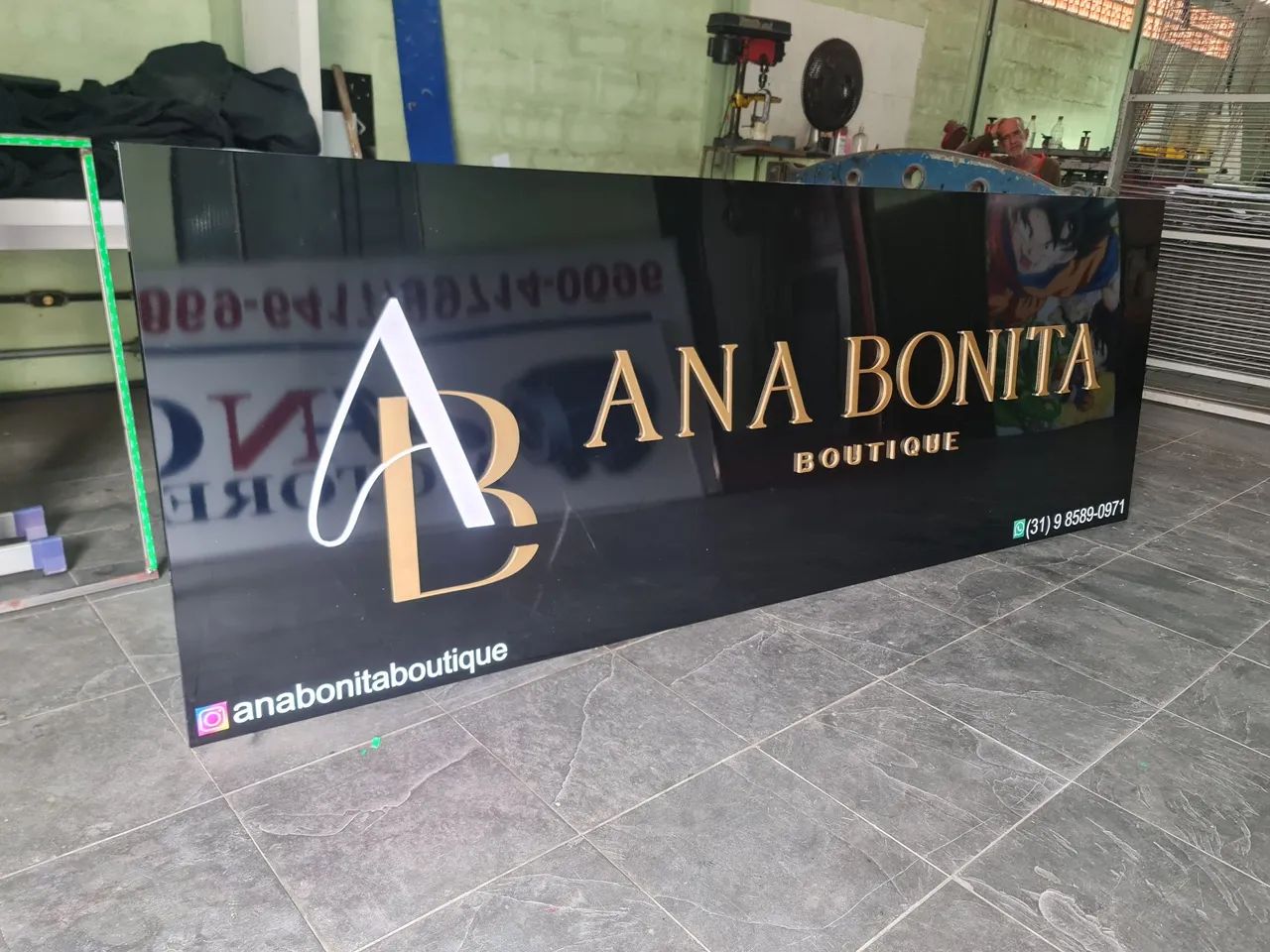 Placa de Loja em acm 