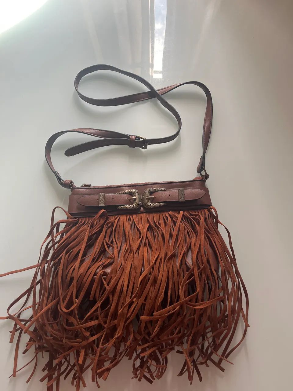 Bolsa tira colo de franja 