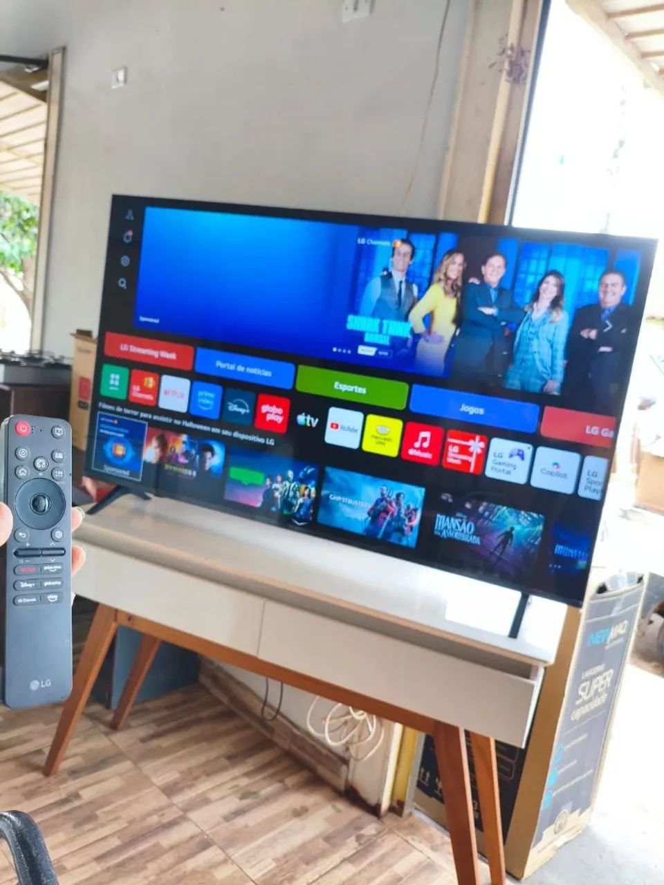 Tv LG 65 Polegadas no plástico ainda 