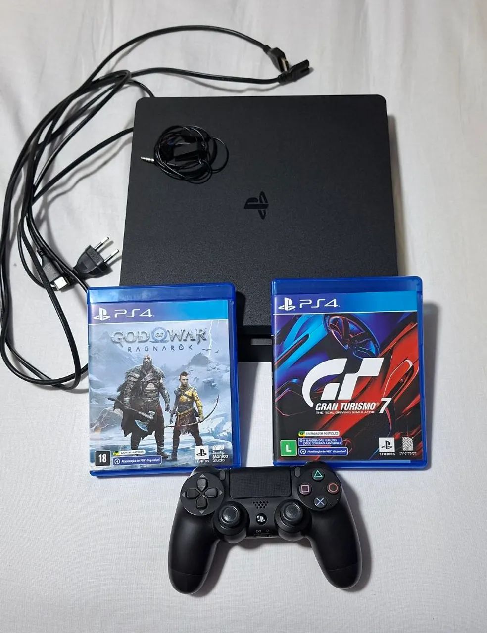 PlayStation 4 Slim 1TB + controle original e dois jogos. Acompanha