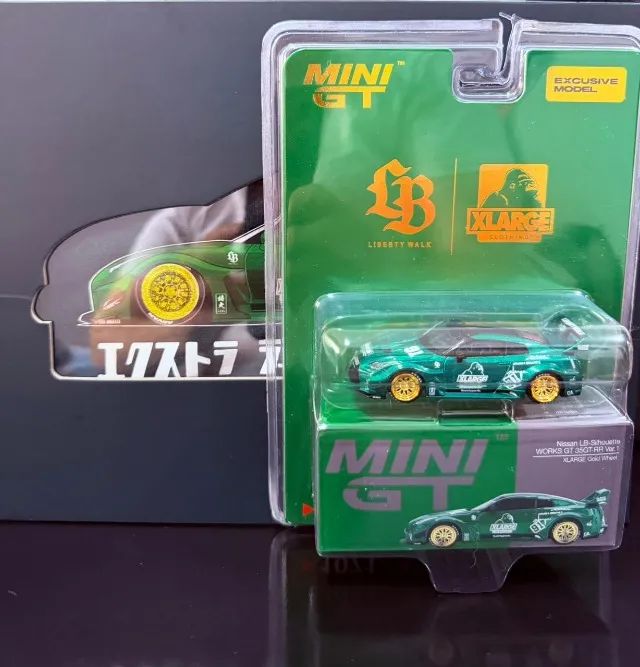 MINI GT NISSAN LB-SILHOUETTE WORKS GT 35GT-RR VER.1 XLARGE GOLD