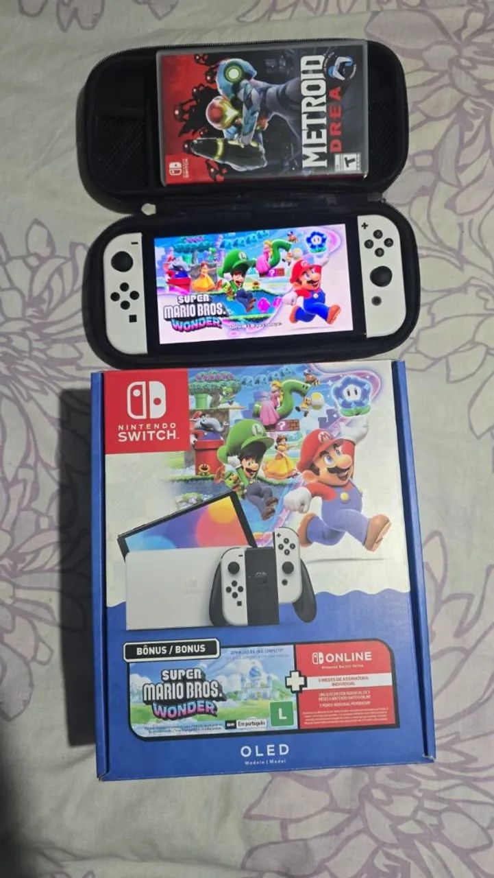 Vendo nintendo switch oled bloqueado com 2 anos de garantia  - Foto 3