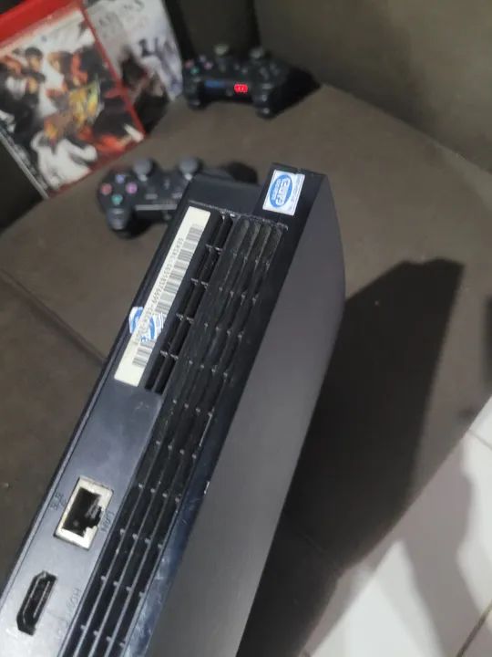 Playstation 3 Slim com jogos - Foto 3