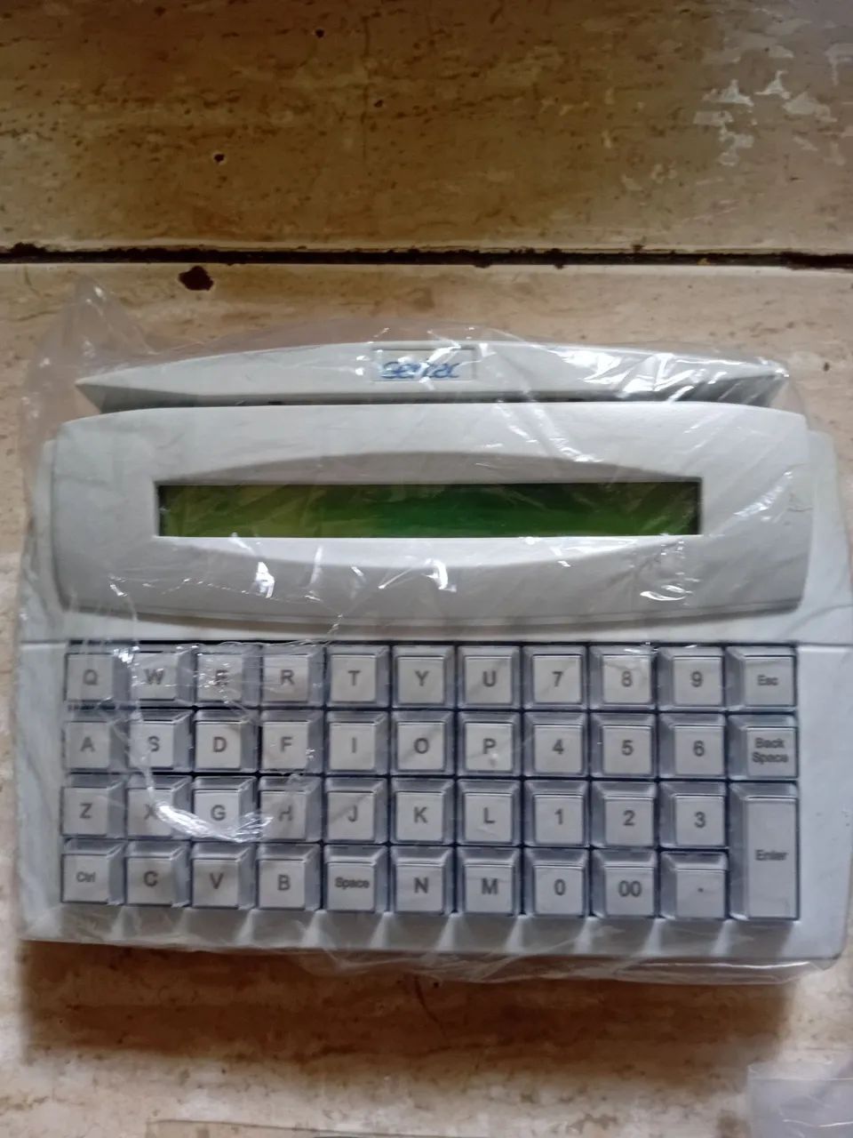 Teclado com display
