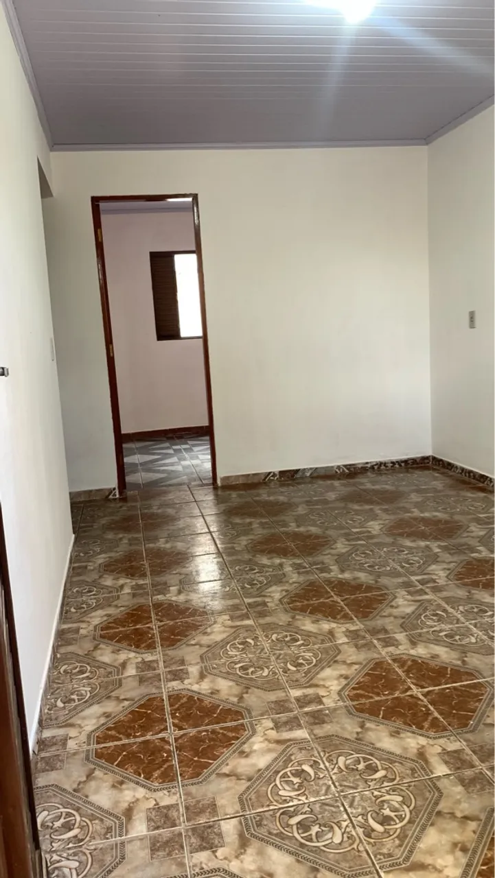 Aluguel casa de fundo R$450,00