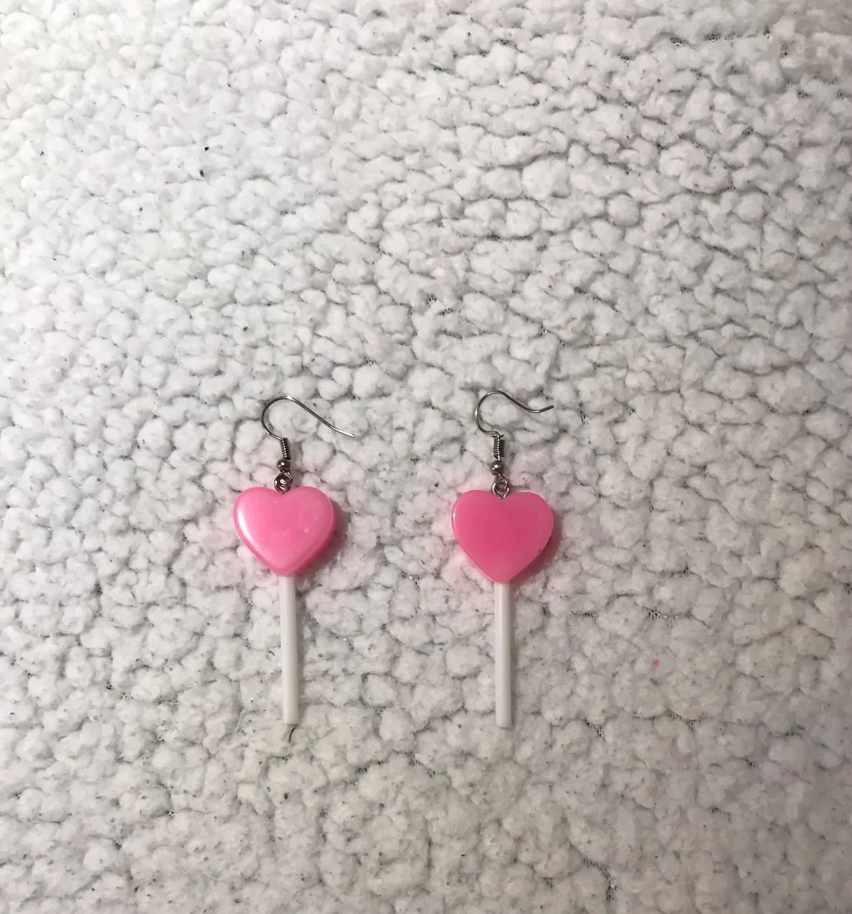 Brinco pirulito de coração rosa