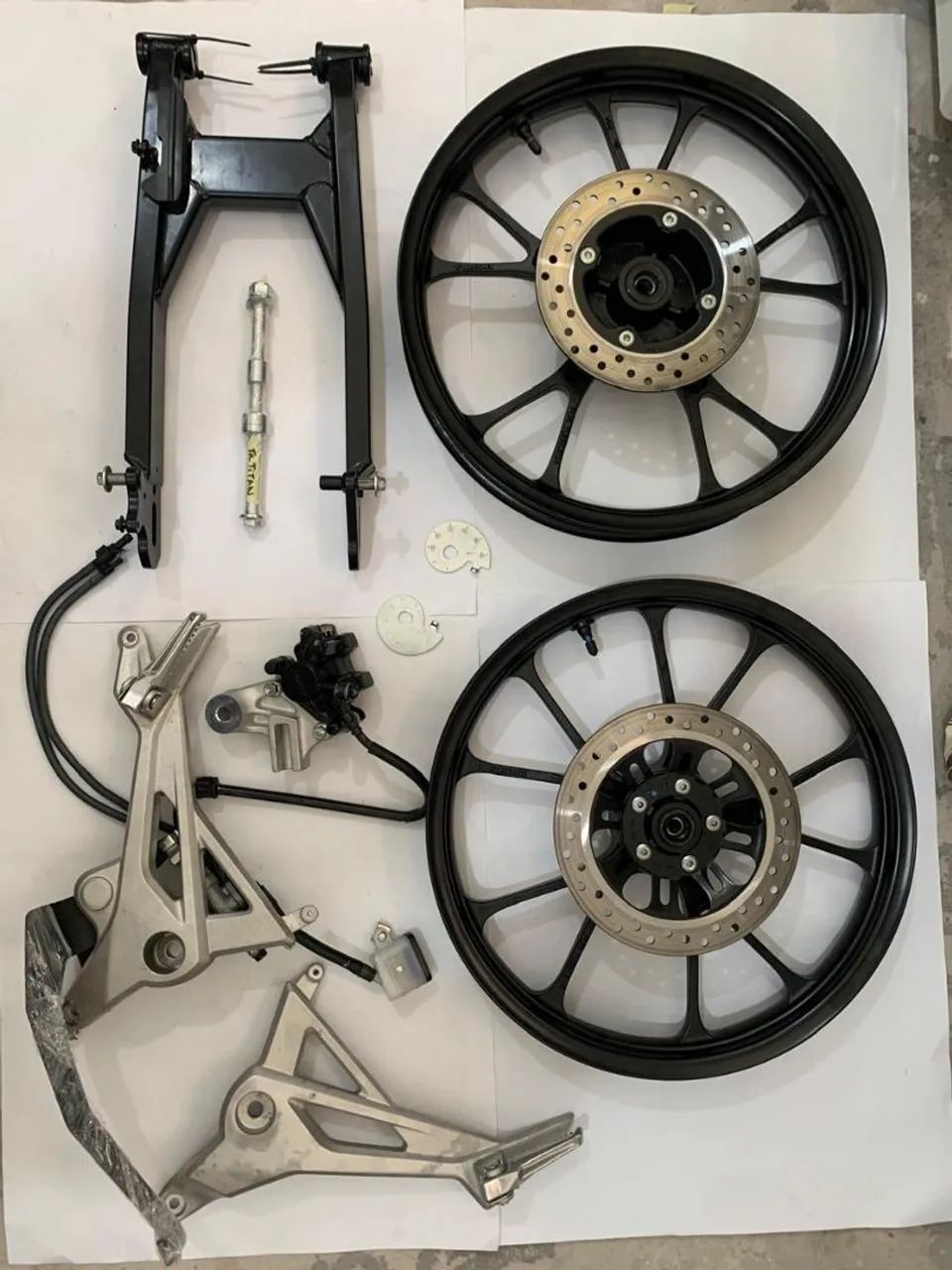 Kit rodas + sistema de freio traseiro Titan 160 (2025-2026) ORIGINAL HONDA 