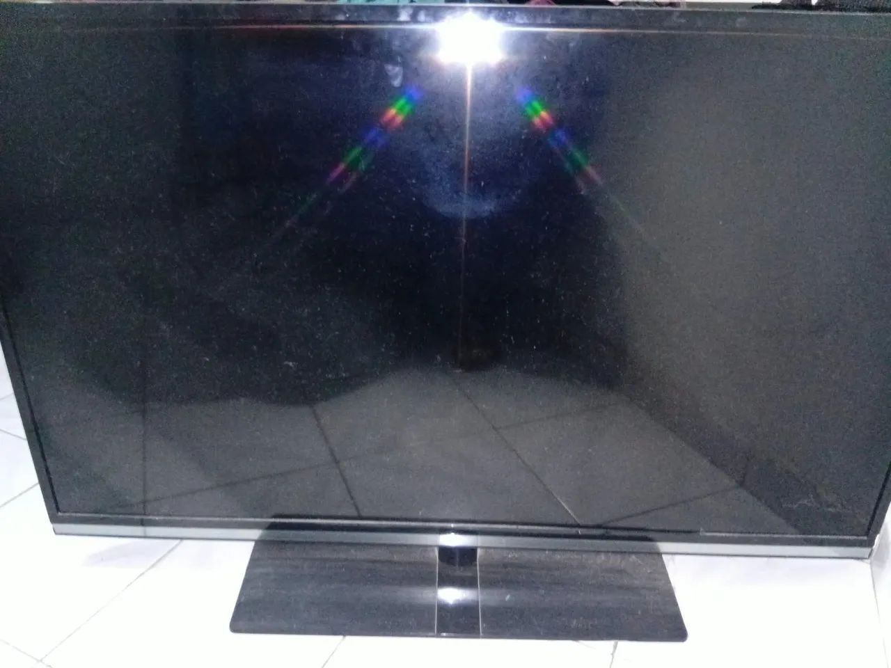 Televisão AOC com defeito 