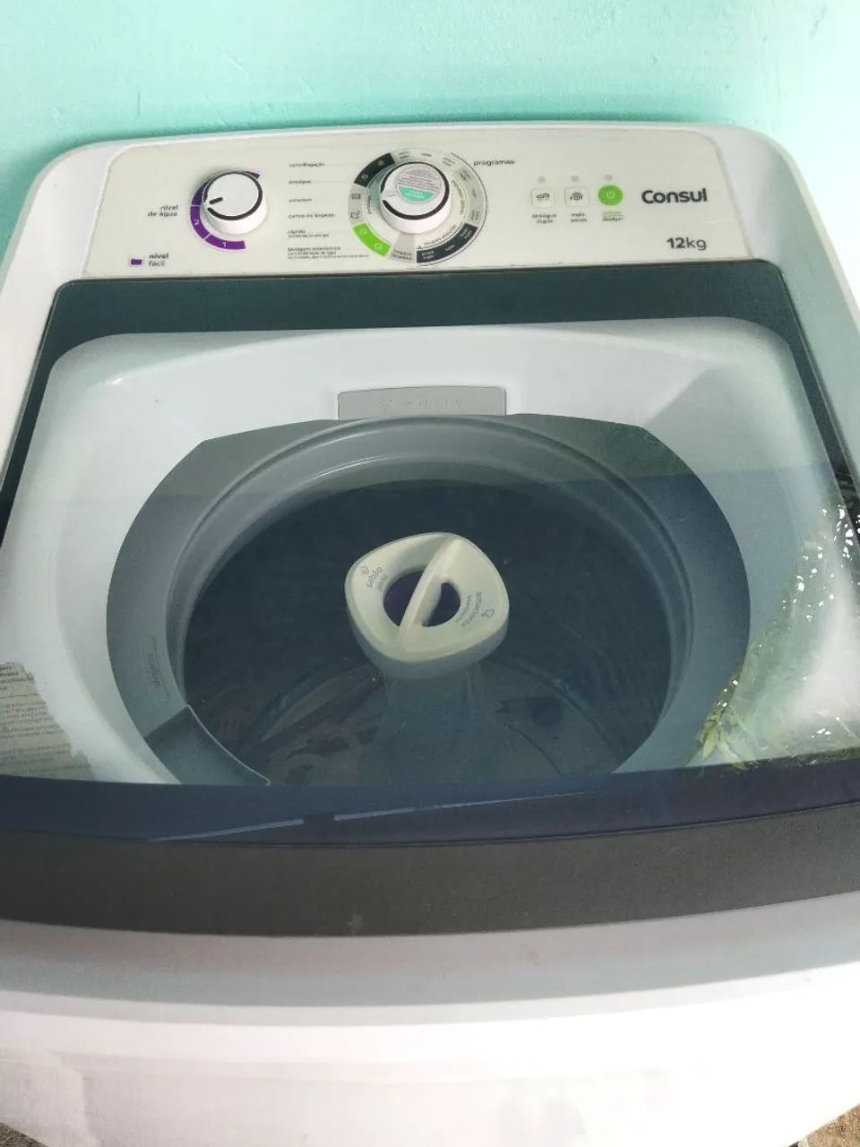 Máquina de lavar roupa com defeito 
