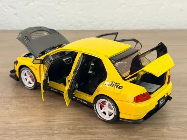 Miniatura Mitsubishi Lancer Evolution IX 1:24 amarelo - som e luz - Foto 3