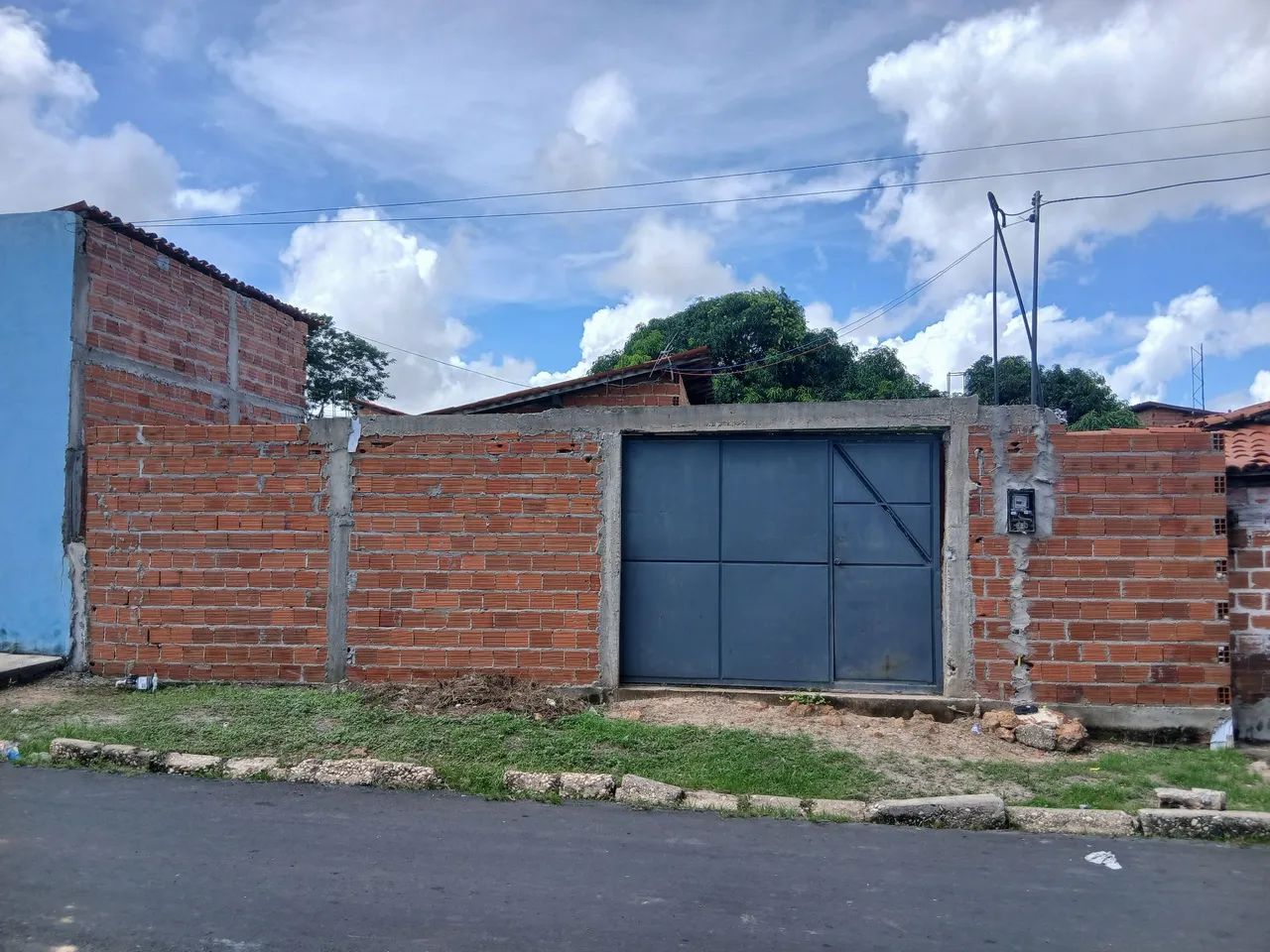 Terreno com casa