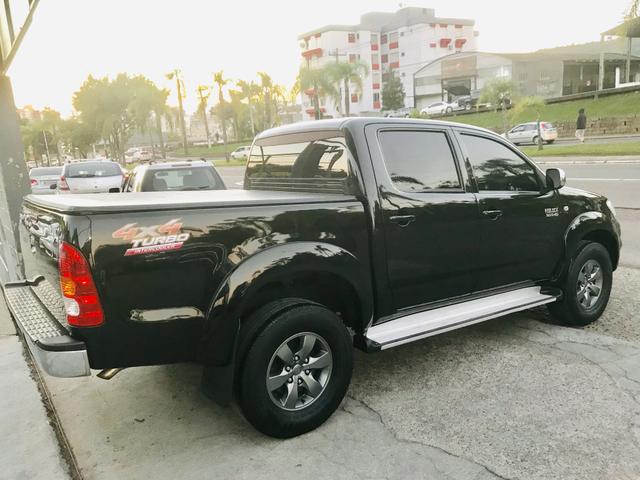 Hilux srv 3.0 diesel turbo 4x4 manual 2009 impecável - Foto 2