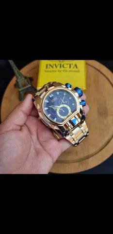 invicta magno Zeus dourado fundo azul 