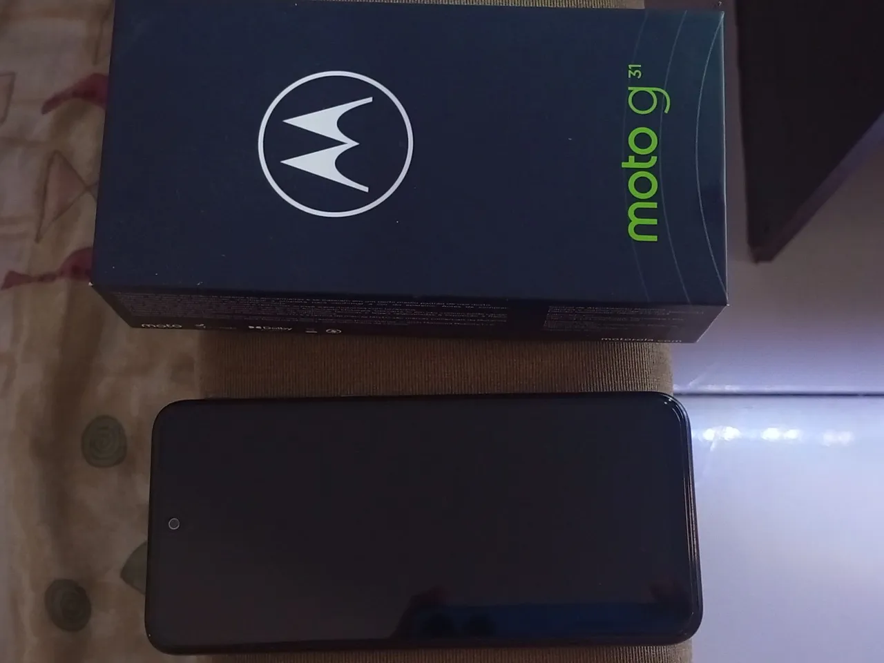 Vendo moto g31 em perfeito sem risco nunca foi aberto. Bem cuidado. Vendendo pq ganhei out