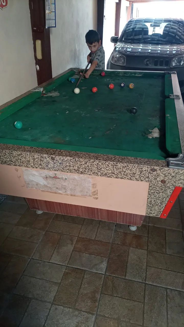 Selling a pool table with cues, balls and rack64315086687617120