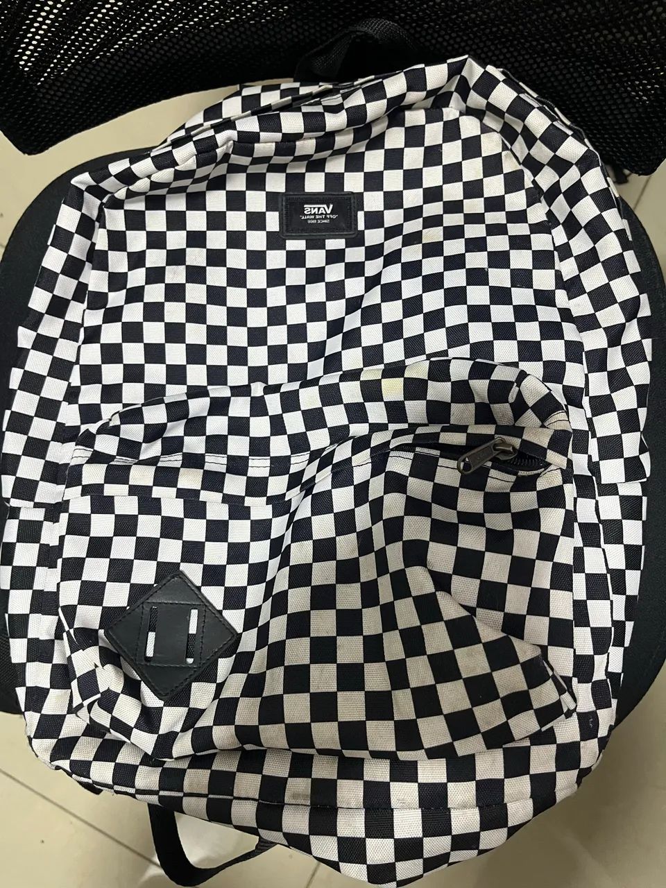 Mochila vans quadriculada preta e branca