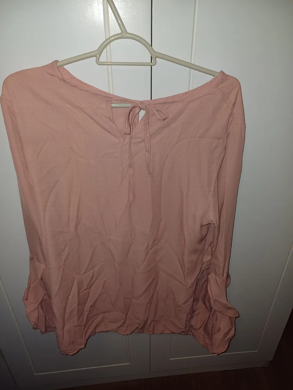 Blusa rosa com detalhe nas costas