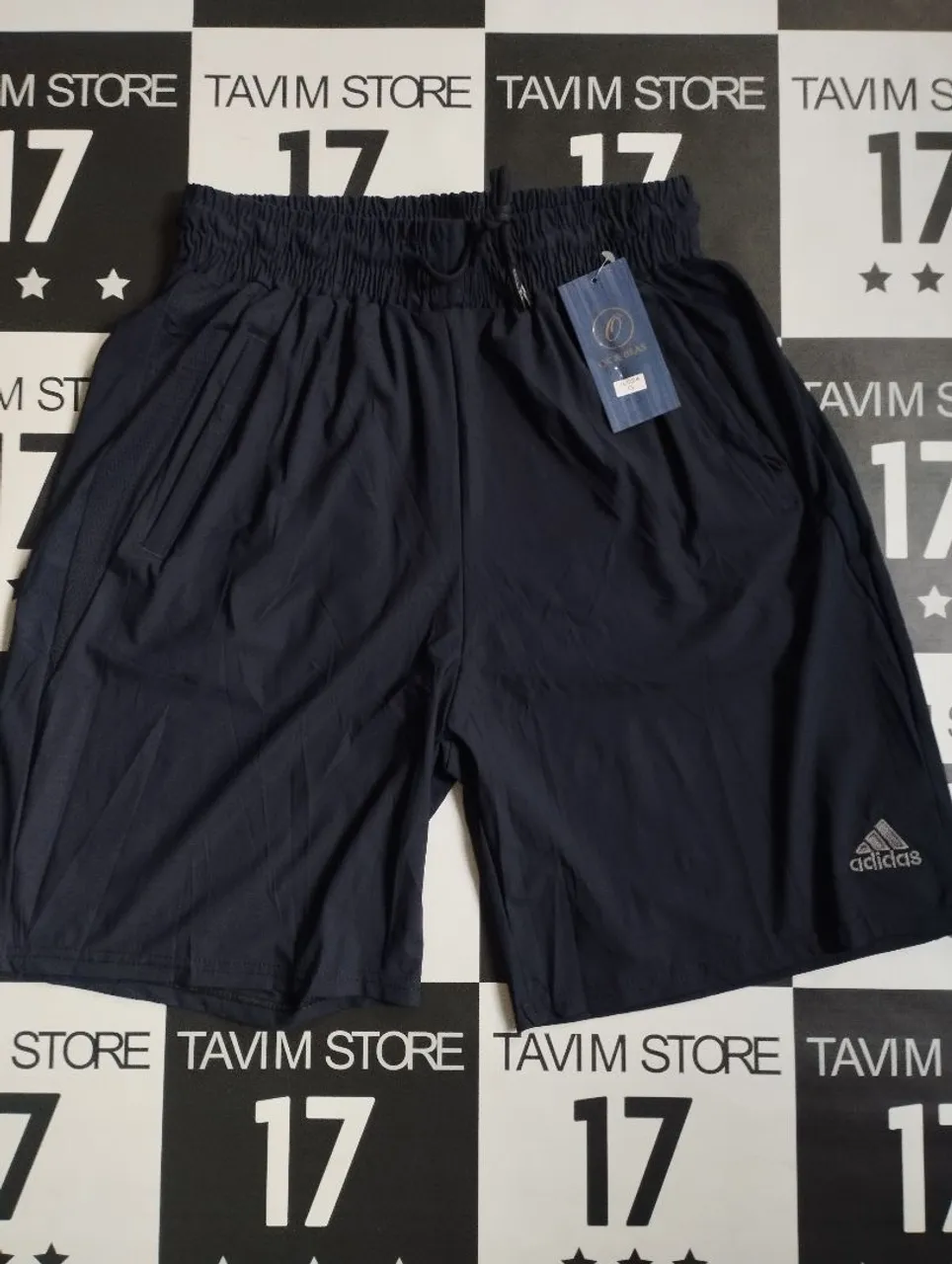 Bermuda Adidas importada azul marinho