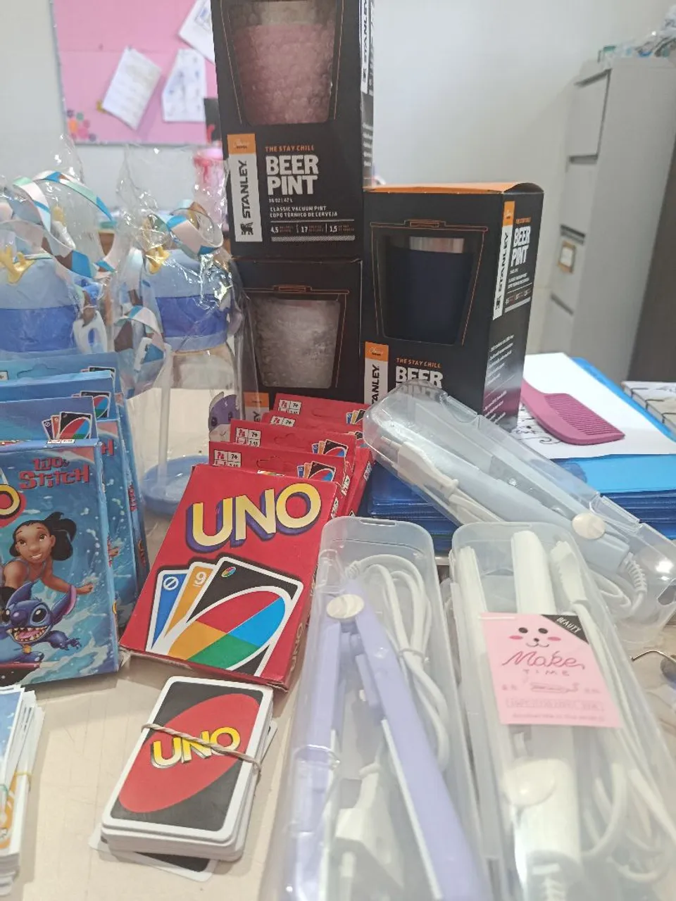 Prancha de bolsa, Uno, garrafinha de plástico, copo térmico