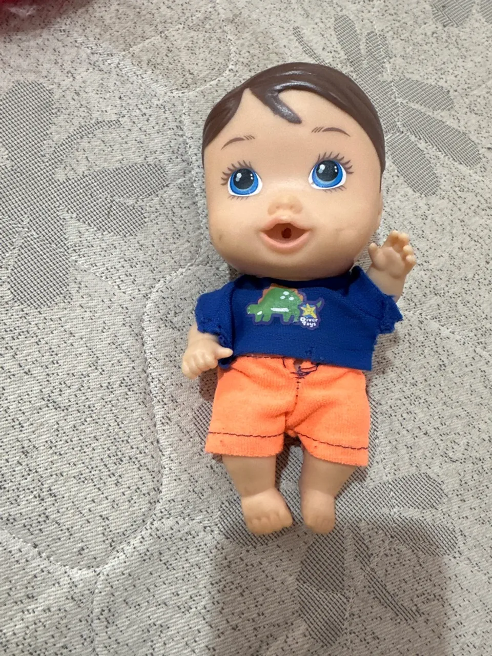 Boneco Baby Diver Toys com Roupa de Dinossauro