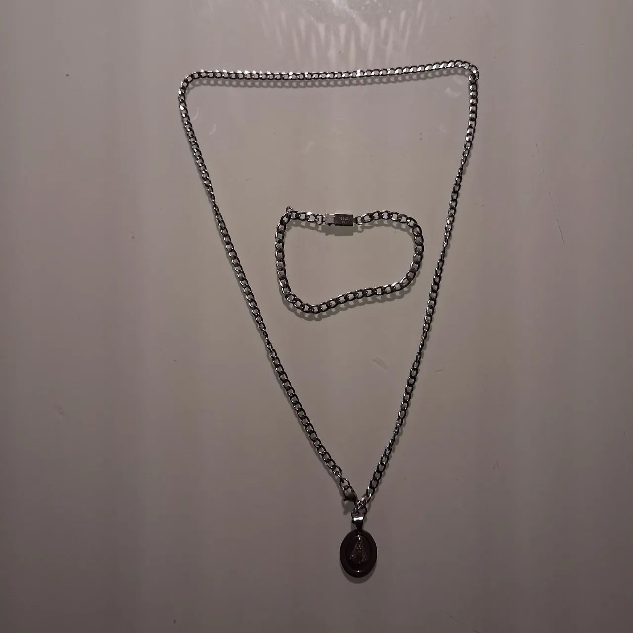 Colar, pingente e pulseira aço.