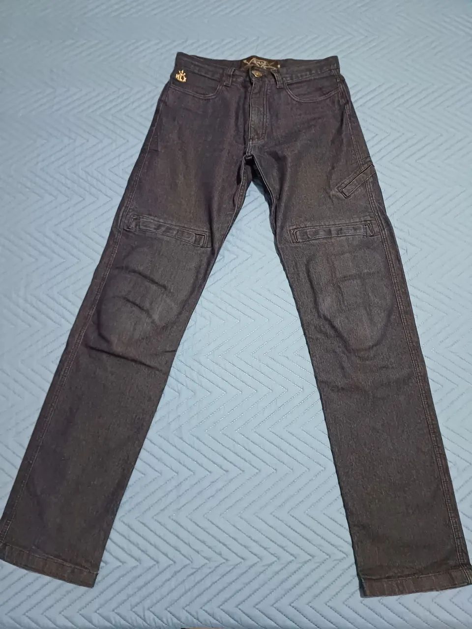Calça para motociclista