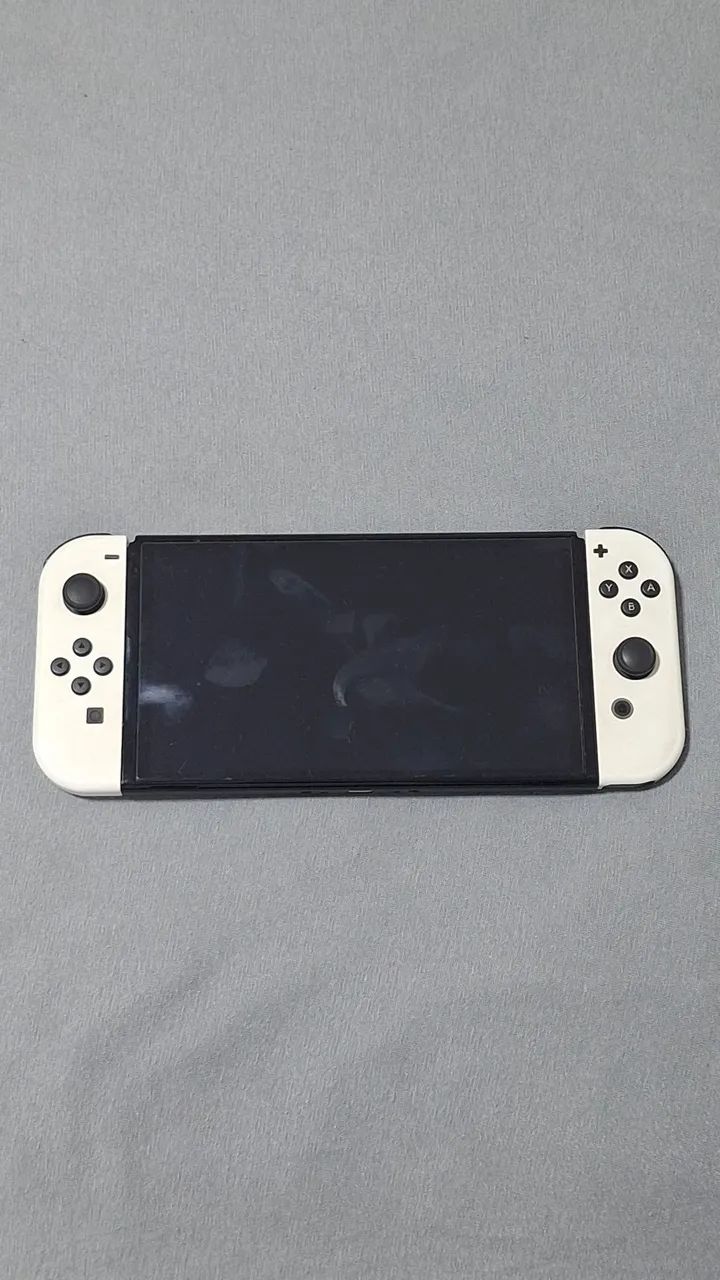 Nintendo switch oled DESBLOQUEADO (com acessórios) - Foto 2