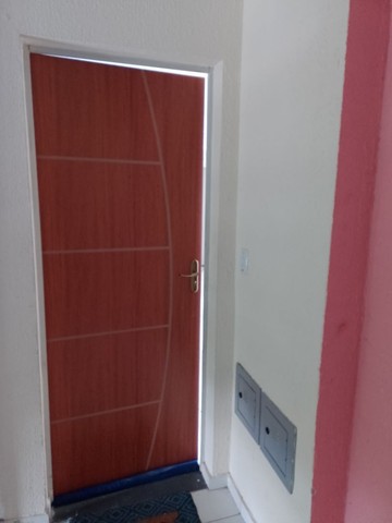 Vendo apartamento no térreo todo pintado e gradeado com 3D na sala