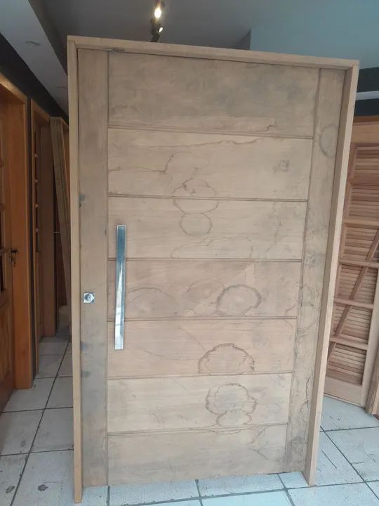 Porta de madeira maciça 128x214mt madeira tauari 10X sem juros 