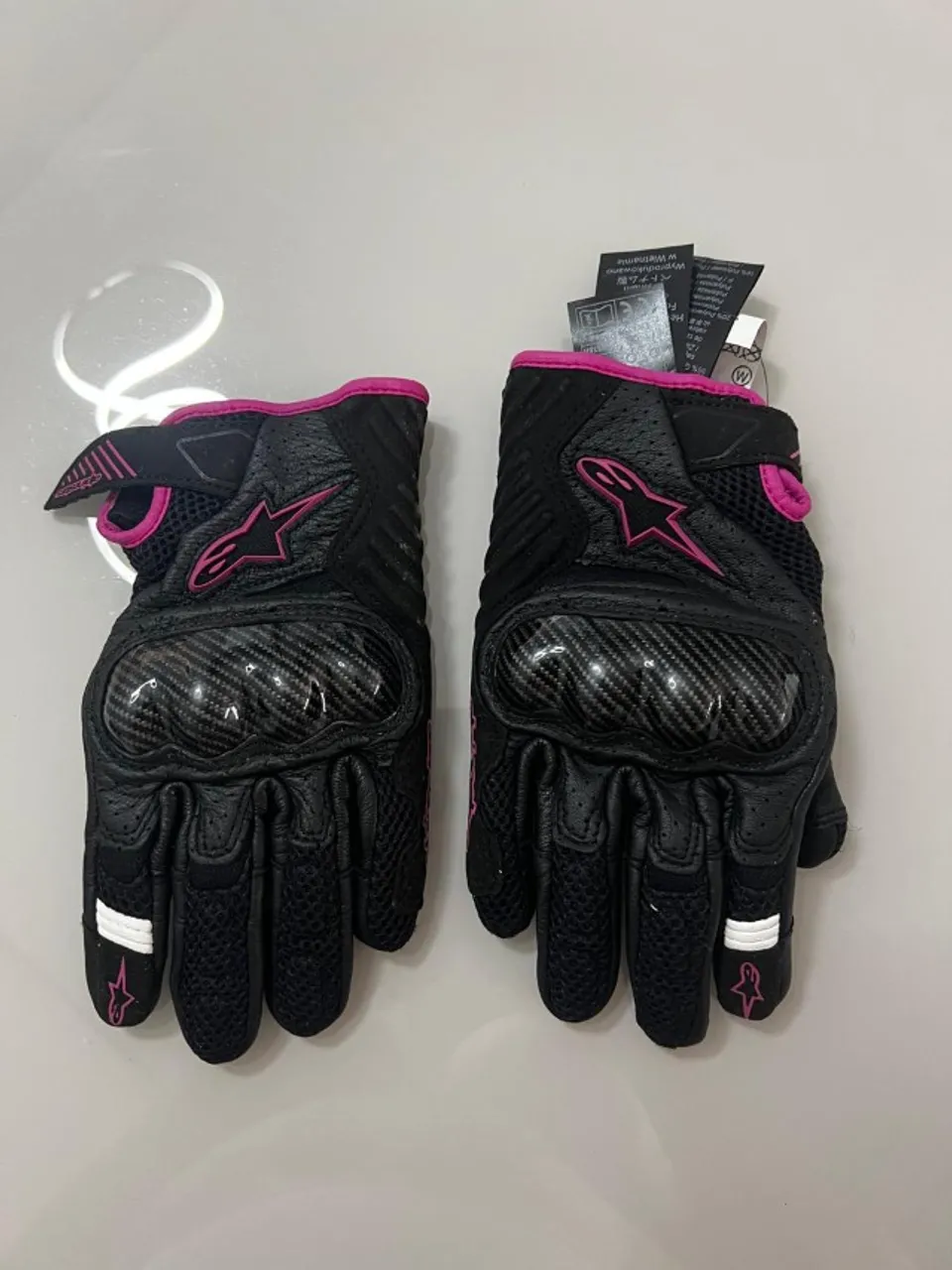 Luva Alpinestars e protetor de coluna nunca usados R$ 150,00 / R$ 400,00