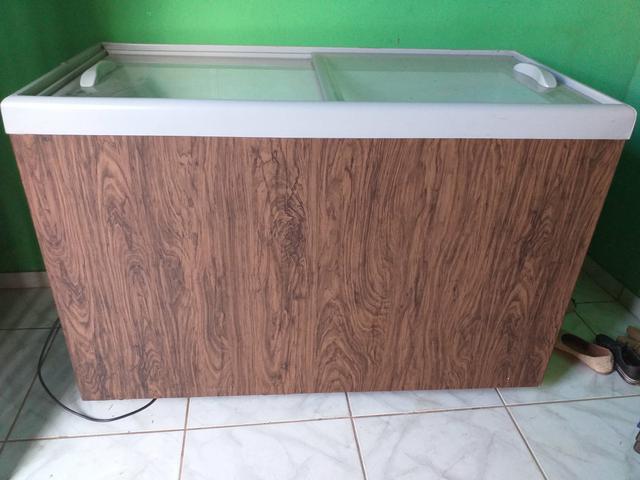 Vendo congelador com tampa de vidro 2 Meses de uso